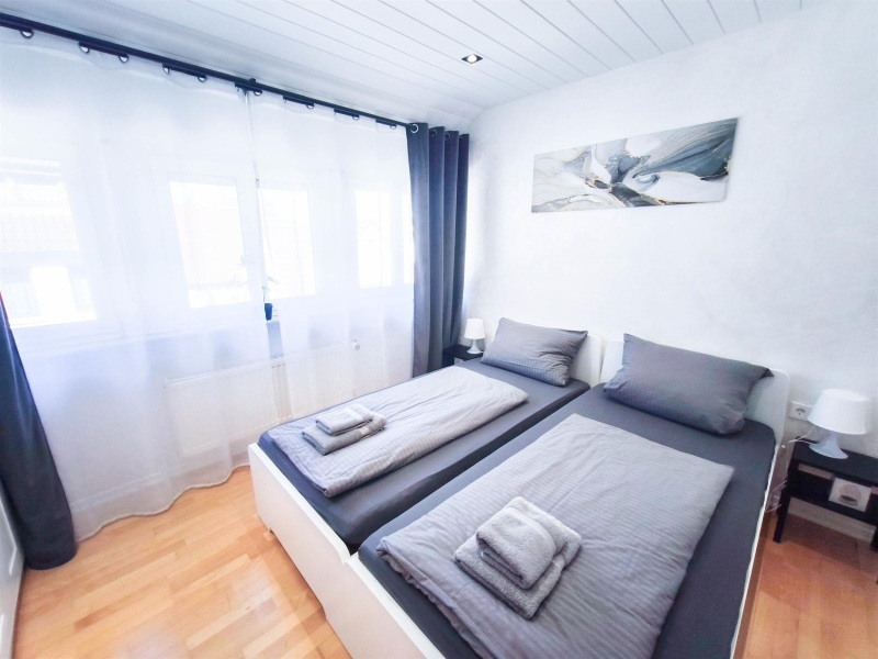 BS18A1_ALFA_APARTMENTS_30_Schlafzimmer_Bedding_Room