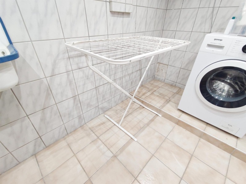 BS18A1_ALFA_APARTMENTS_78_Waschkueche_Waeschestaender_Standing_Dryer